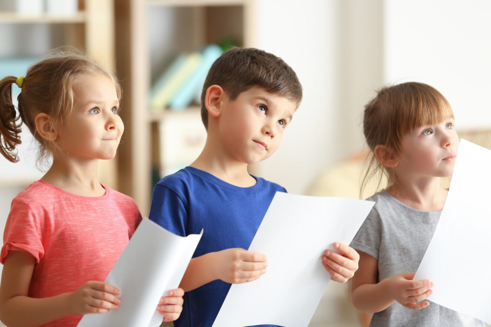 Cute kids singing in music class